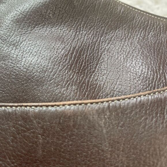 Maxx New York Leather Brown medium shoulder bag with silver tone hardwares.